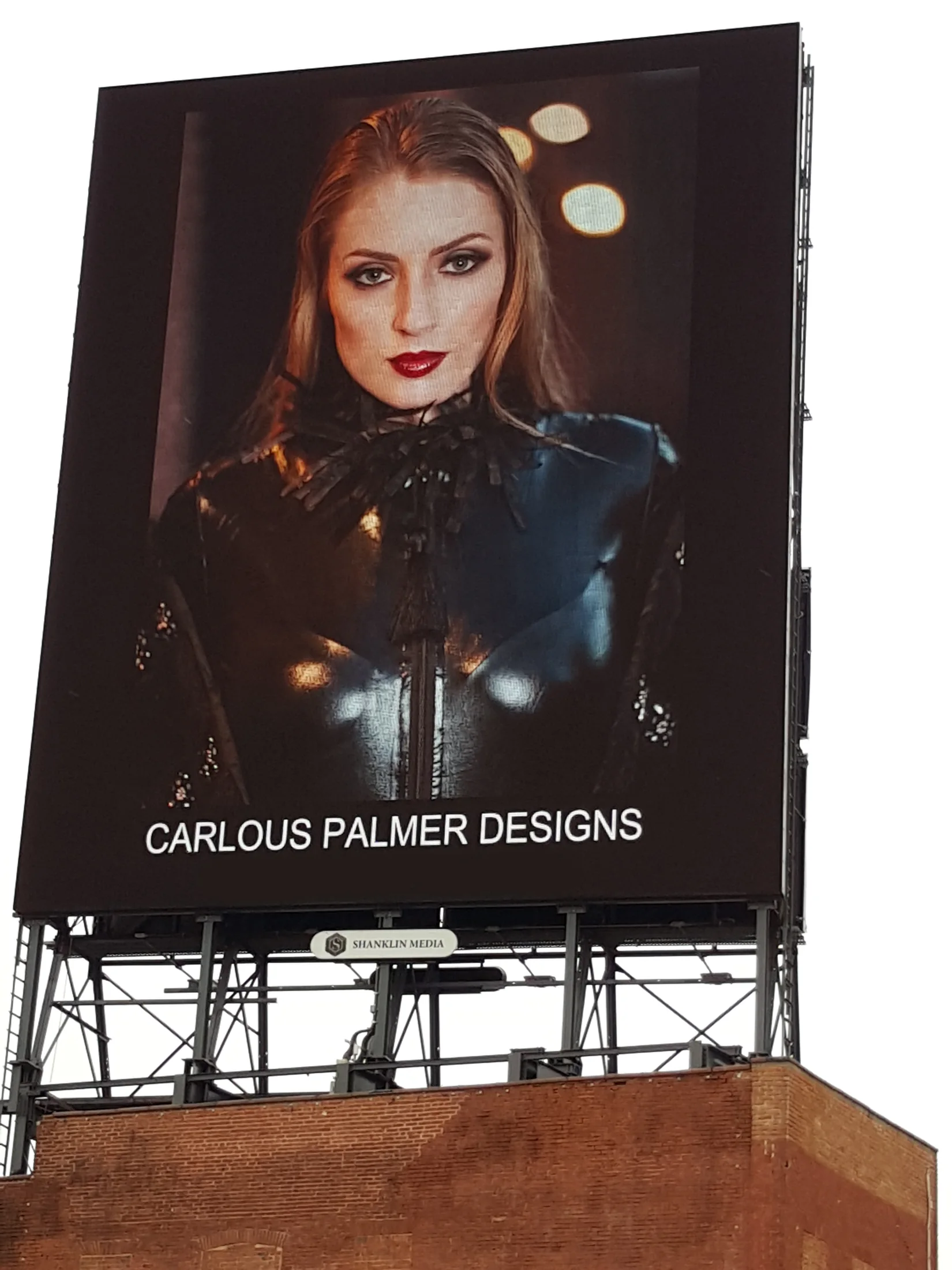 Carlous Palmer Designs billboard in Baltimore