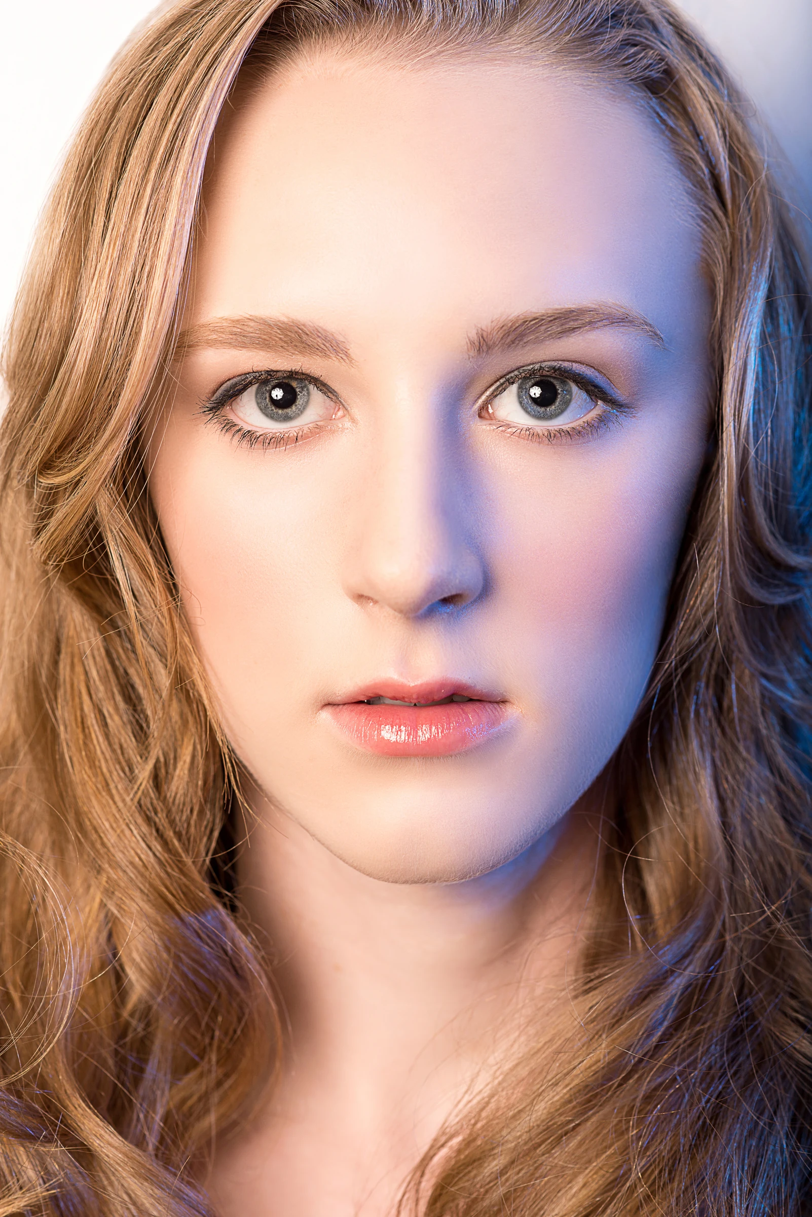 Studio headshot with warm and cool light